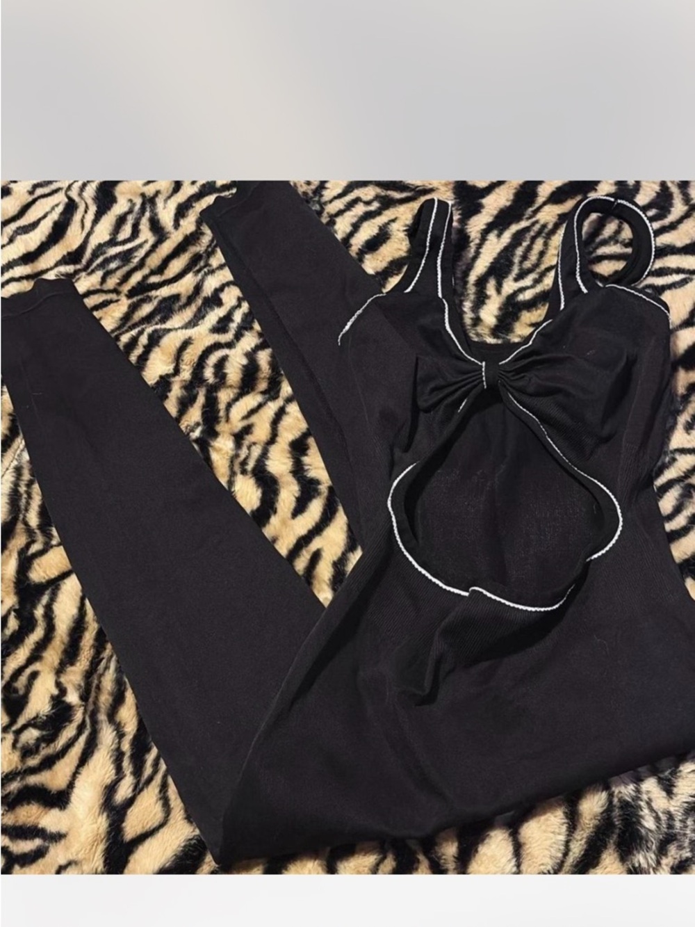 Black Cutout Knit Jumpsuit with White Contrast Trim